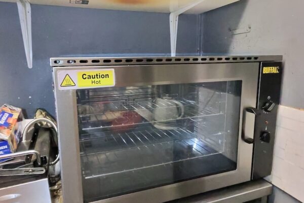 Fully cleaned and polished Buffalo commercial oven ready for service in a Tamworth deli kitchen.