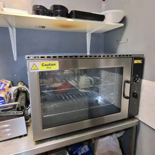 Fully cleaned and polished Buffalo commercial oven ready for service in a Tamworth deli kitchen.