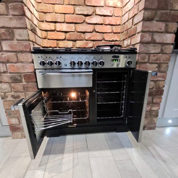 Rangemaster Professional range cooker in Hopwas with both cleaned ovens open and shelves refitted.